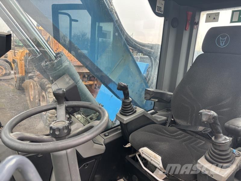 Fuchs MHL320 Avfalls / industri hantering