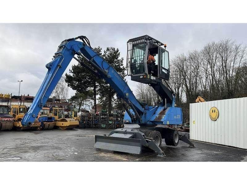 Fuchs MHL320 Avfalls / industri hantering