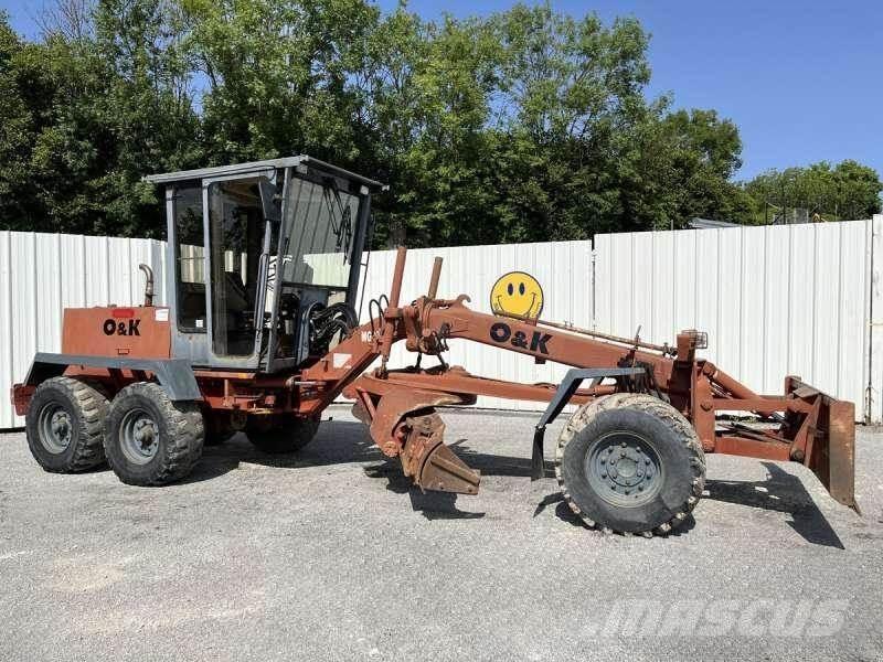 O&K F106 Väghyvlar