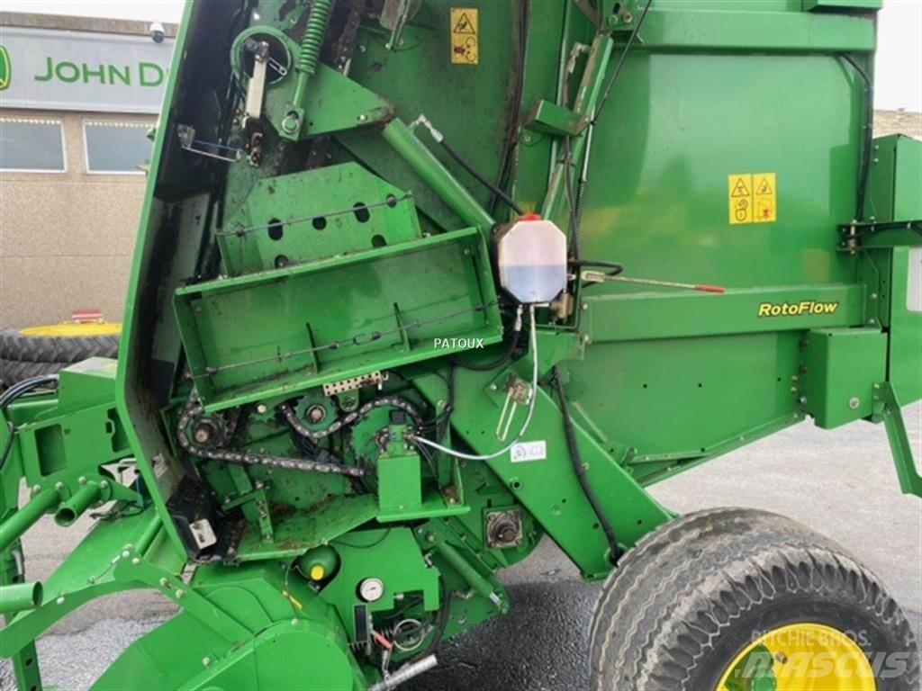 John Deere 864 Rundbalspressar