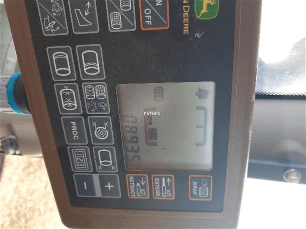 John Deere 864 Rundbalspressar