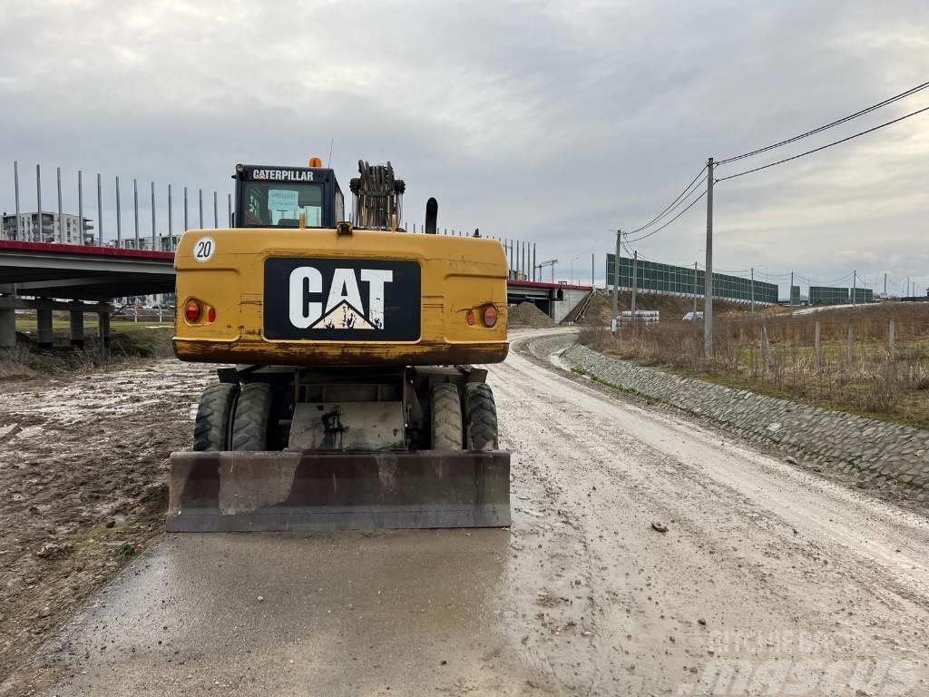 CAT M318D Hjulgrävare