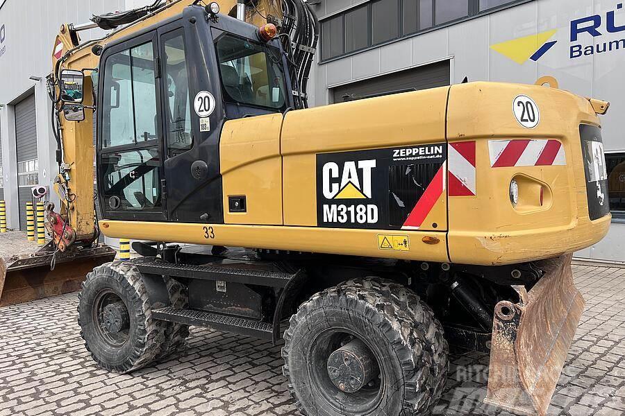 CAT M 318 D Hjulgrävare