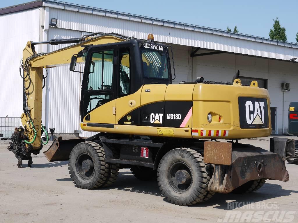 CAT M 313 D Hjulgrävare